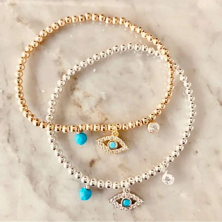 3mm Bead Stretch Bracelet with Matching Eye, CZ Bezel, and Turquoise Charms